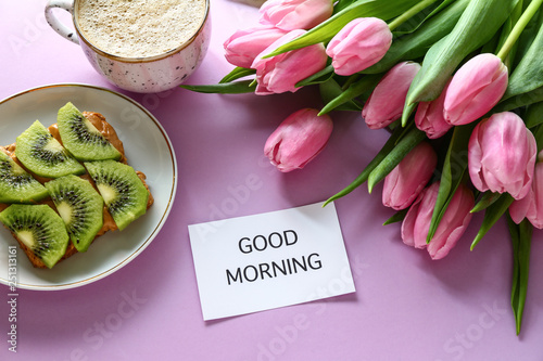 Tablou Canvas Bouquet of beautiful tulips, tasty breakfast and paper with text GOOD MORNING on