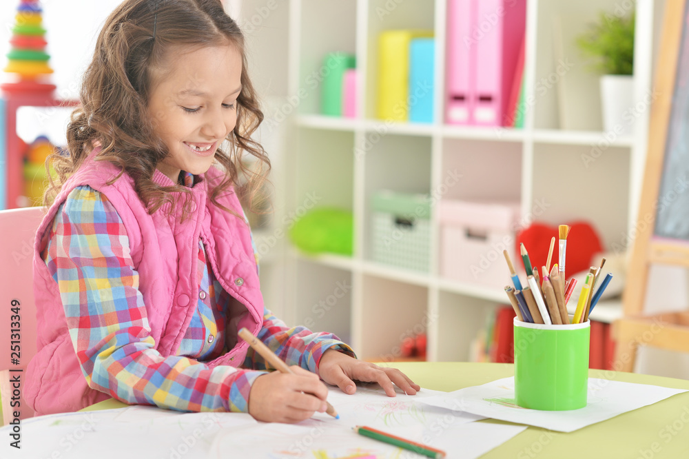 Portrait of cute beautiful smiling girl drawing at home Portrait of cute beautiful smiling girl drawing at home