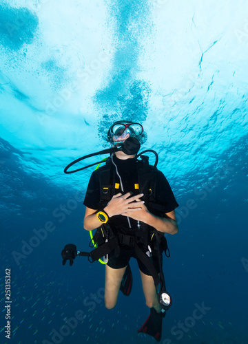 Young woman scuba diver.