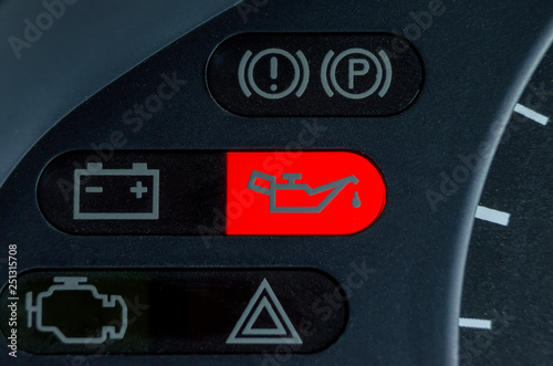 Screen symbols battery and Oil lamp warning light in-car dashboard photo
