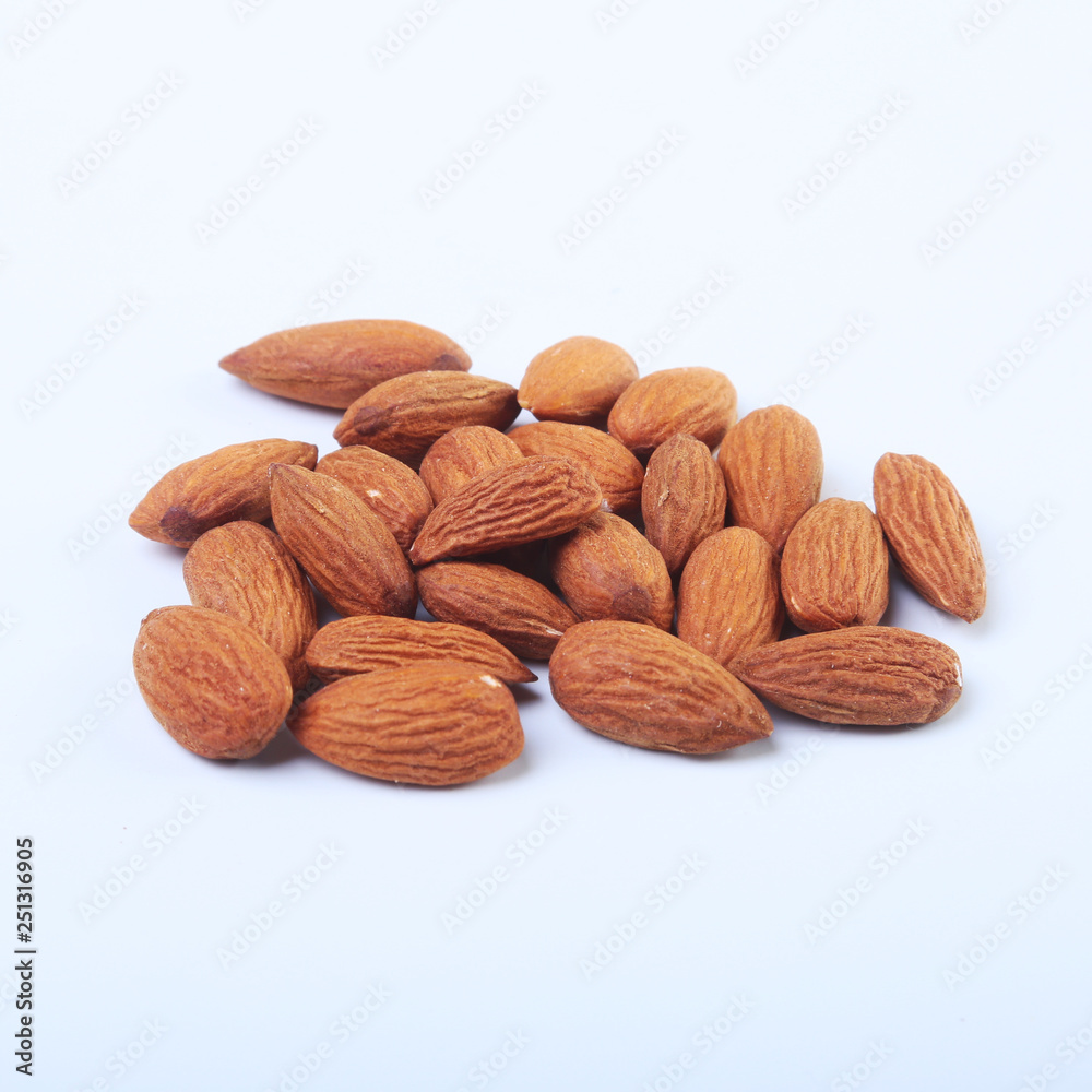 nuts almonds isolated on white background. Selective focus. nuts almonds isolated on white background. Selective focus.