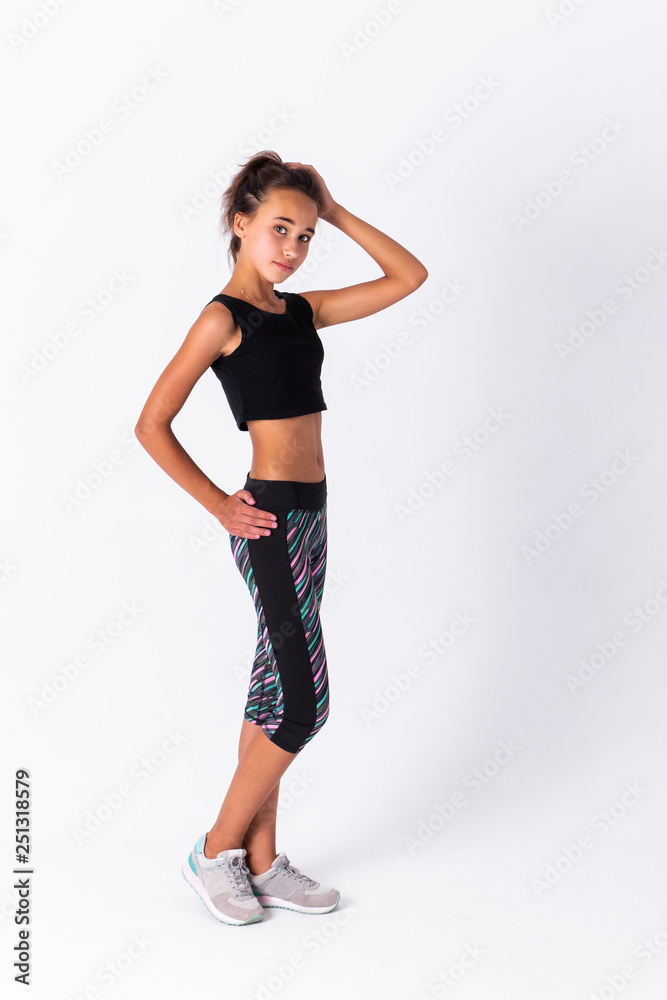 Young athletic girl isolated on white background. Young athletic girl isolated on white background.