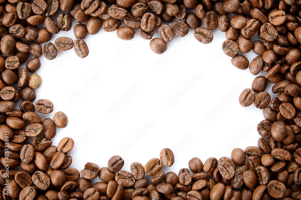 A frame from roasted coffee beans with empty copy space. Top view coffee isolated on white background A frame from roasted coffee beans with empty copy space. Top view coffee isolated on white background