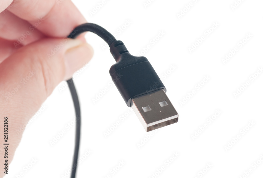 USB cable in the hands, isolated, closeup USB cable in the hands, isolated, closeup