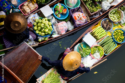 Tha Kha floating market in Thailand. Local farmers selling vegetables.