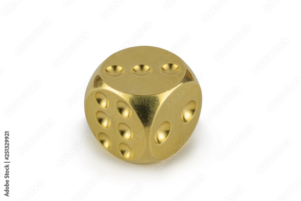 One golden dice isolated on white background. Three, view with shadow. One golden dice isolated on white background. Three, view with shadow.
