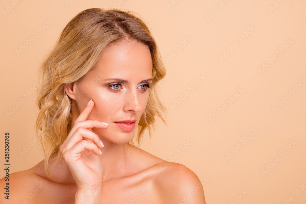 Close-up portrait of nice dreamy attractive adorable wavy-haired nude lady with flawless shine fresh skin touching cheek lifting botox collagen copy empty blank space isolated on beige background Close-up portrait of nice dreamy attractive adorable wavy-haired nude lady with flawless shine fresh skin touching cheek lifting botox collagen copy empty blank space isolated on beige background
