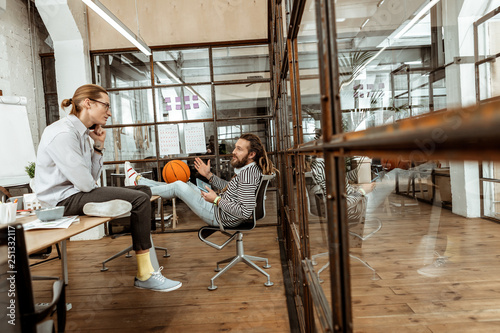Wallpaper Mural Nice relaxed young men having a conversation Torontodigital.ca