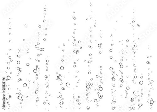 Underwater fizzing air bubbles on white background.