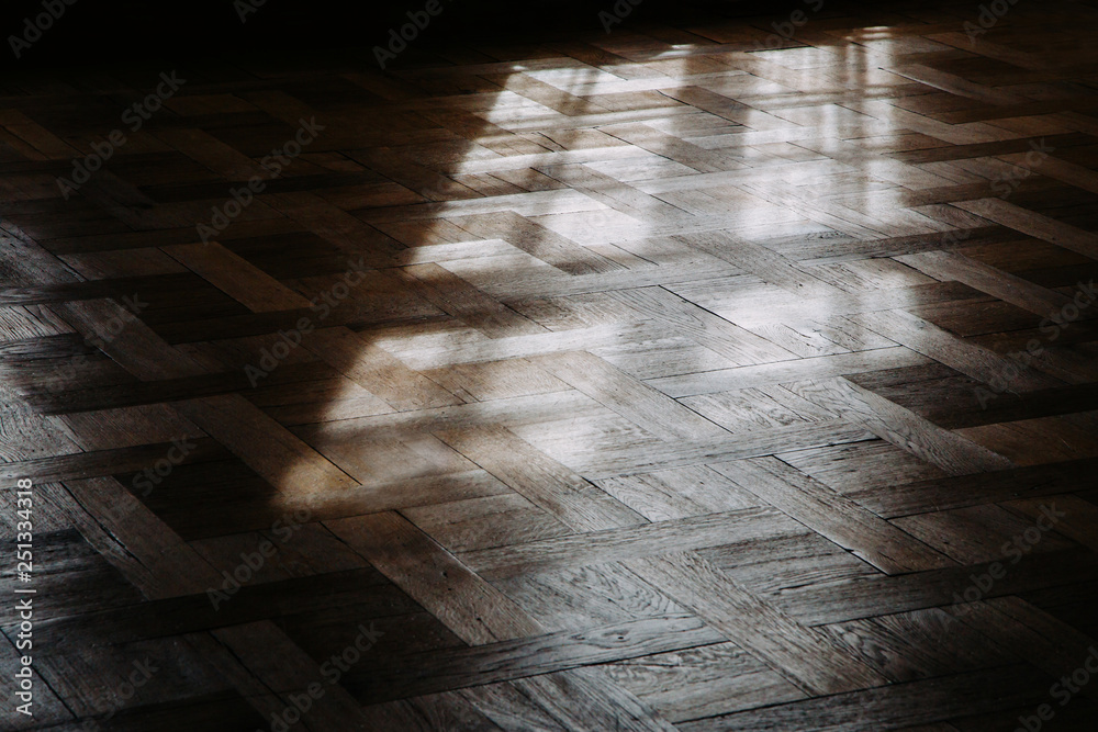 Wooden floor background in a morning light. Shadows of the window frame. Low angle view. - obrazy, fototapety, plakaty 