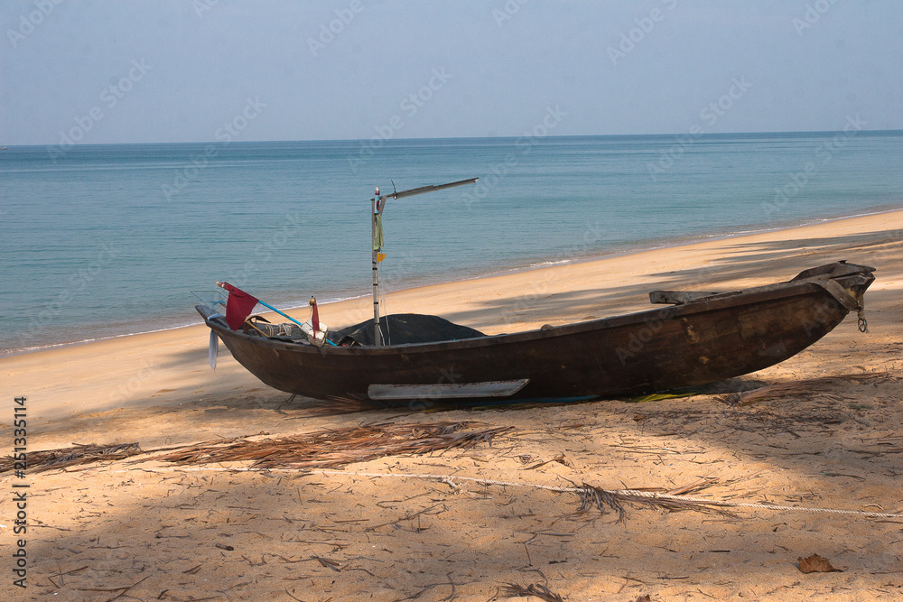 Wooden fishing boat on the Andaman Sea in Thailand Wooden fishing boat on the Andaman Sea in Thailand