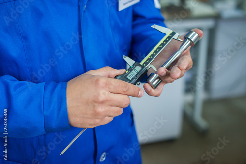 Quality Specialist Hands with measuring devices