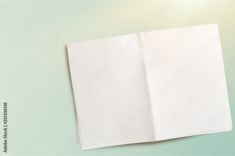 Close up of a crumpled unfolded piece of paper on white background Close up of a crumpled unfolded piece of paper on white background
