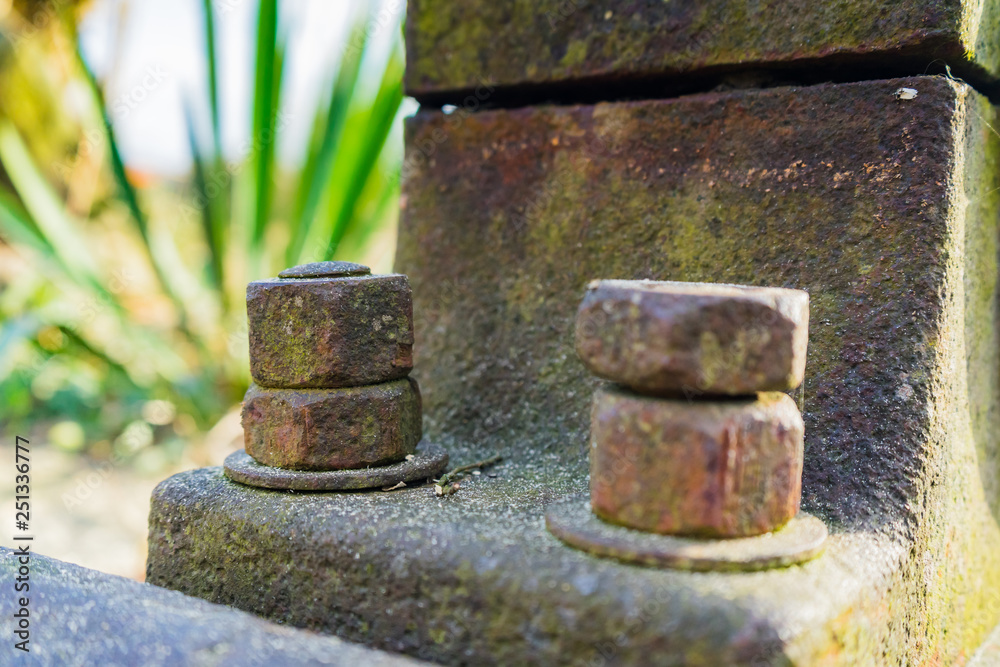Old rusty waterwheel. Detail shot of a bolt Old rusty waterwheel. Detail shot of a bolt