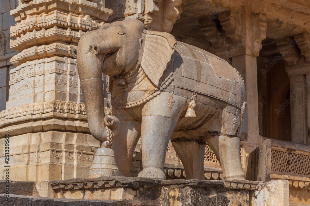 statue of elephant with bell in old temple near Jaipur, India