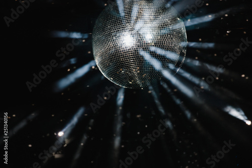 A big disco ball isolated on black.