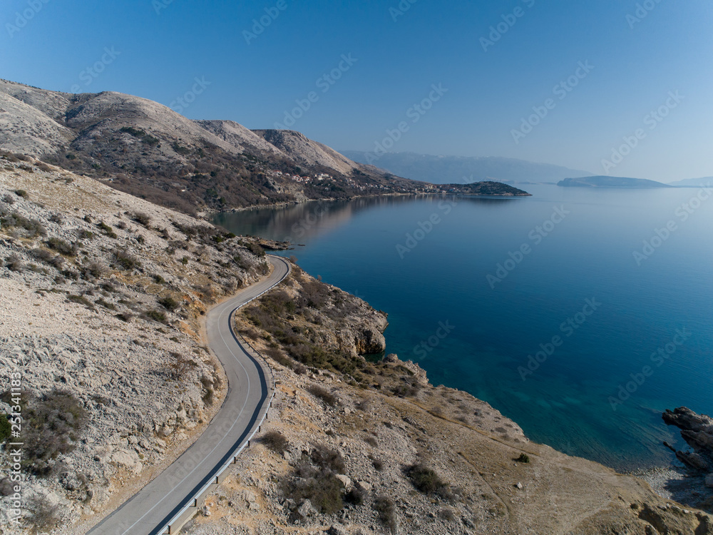 Beautiful road leading in Stara baska(old baska) on island Krk in Croatia Beautiful road leading in Stara baska(old baska) on island Krk in Croatia