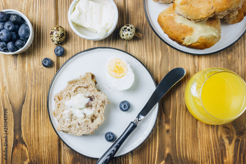 Traditional Easter treats cross buns wwith fresh butter