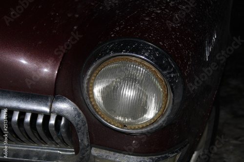 a fragment of the old car and the headlights