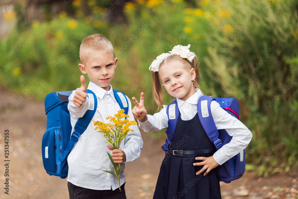 fairhaired cute happy children, boy and girl, brother and sister