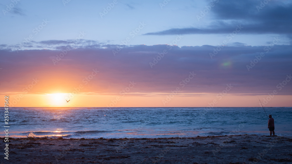 Blue and pink sunset in western Australia at the beach, eagles, fishermen, beautiful