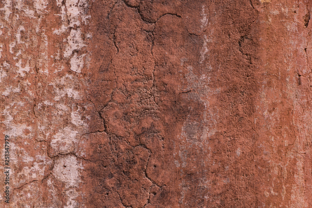 red grunge background: wall of old temple in India red grunge background: wall of old temple in India