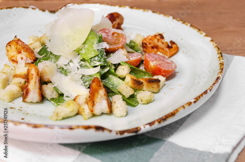Shrimp Caesar salad with Parmesan cheese, croutons and lettuce