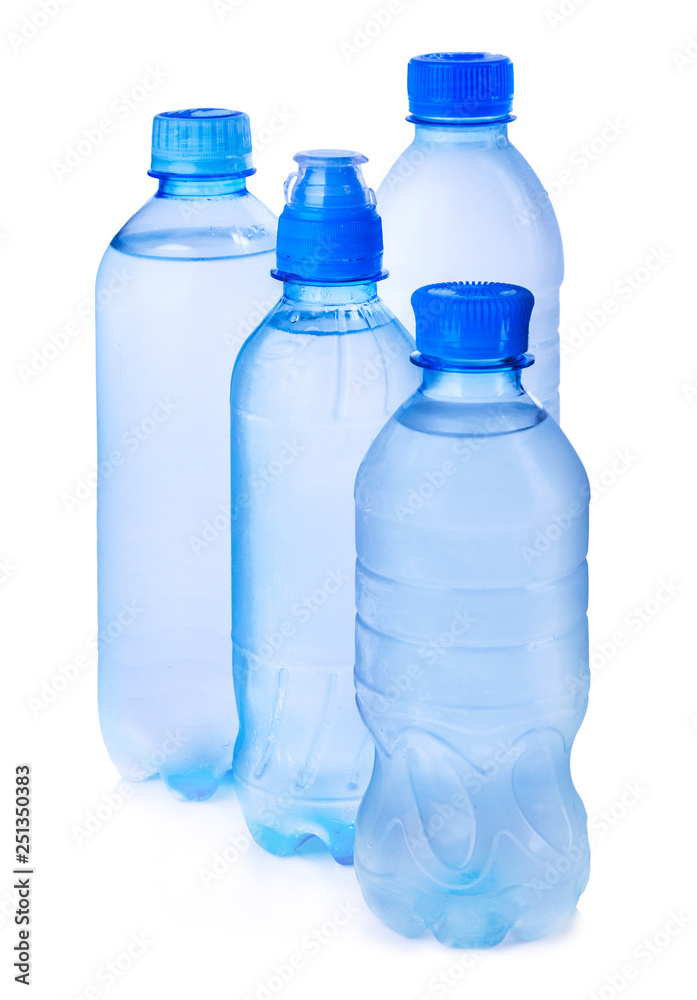 Plastic bottle of drinking water isolated on white background. Set of water transparent plastic bottles liquid containers Plastic bottle of drinking water isolated on white background. Set of water transparent plastic bottles liquid containers