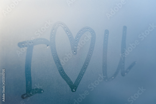 Wallpaper Mural Love heart sign and foggy condensated window with blurry effect textured outdoors background, close up image. Torontodigital.ca