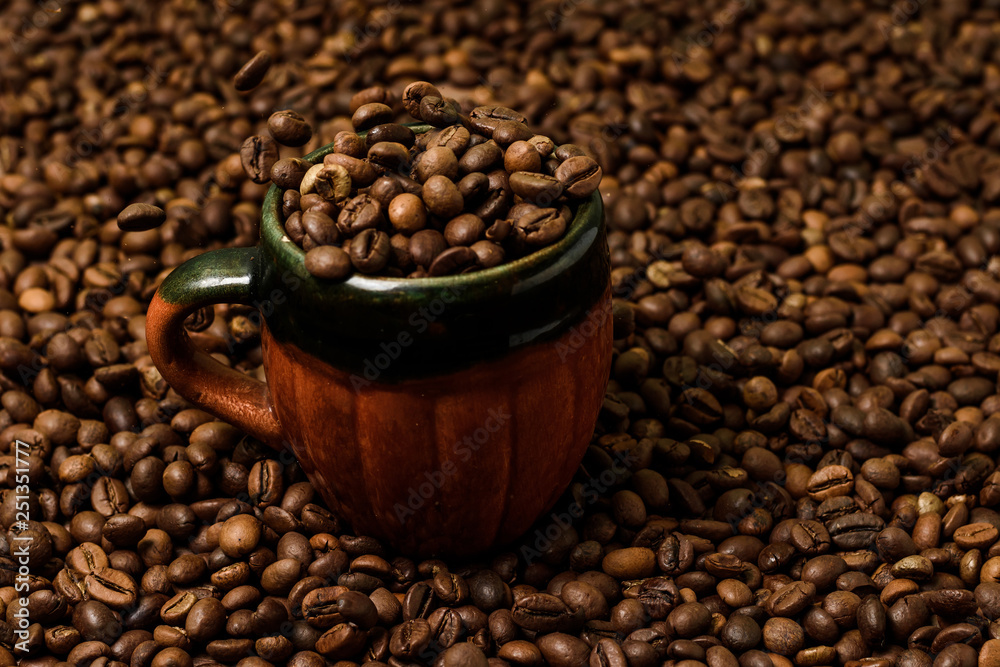 mug with grains of coffee