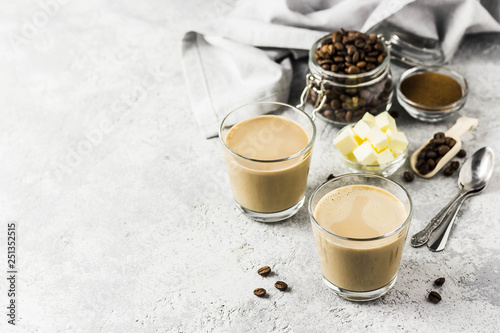 Keto bulletproof coffee in glasses. Selective focus, space for text.