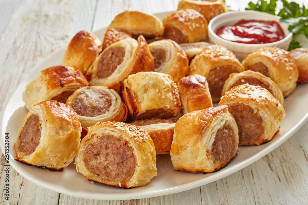 freshly baked Puff pastry Sausage rolls, close-up