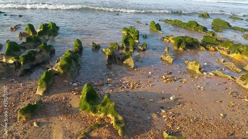aglou brach beautiful green rocks in south of morocco photo