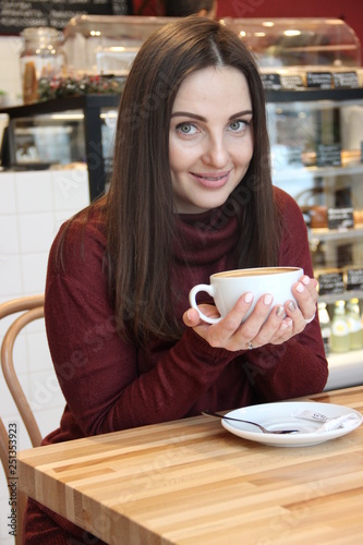 young woman in cafe