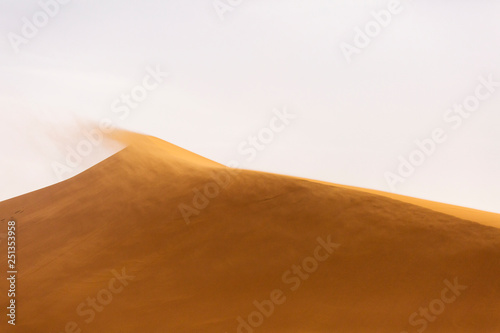 Desert Sahara with beautiful lines and colors at sunrise. Merzouga  Morocco