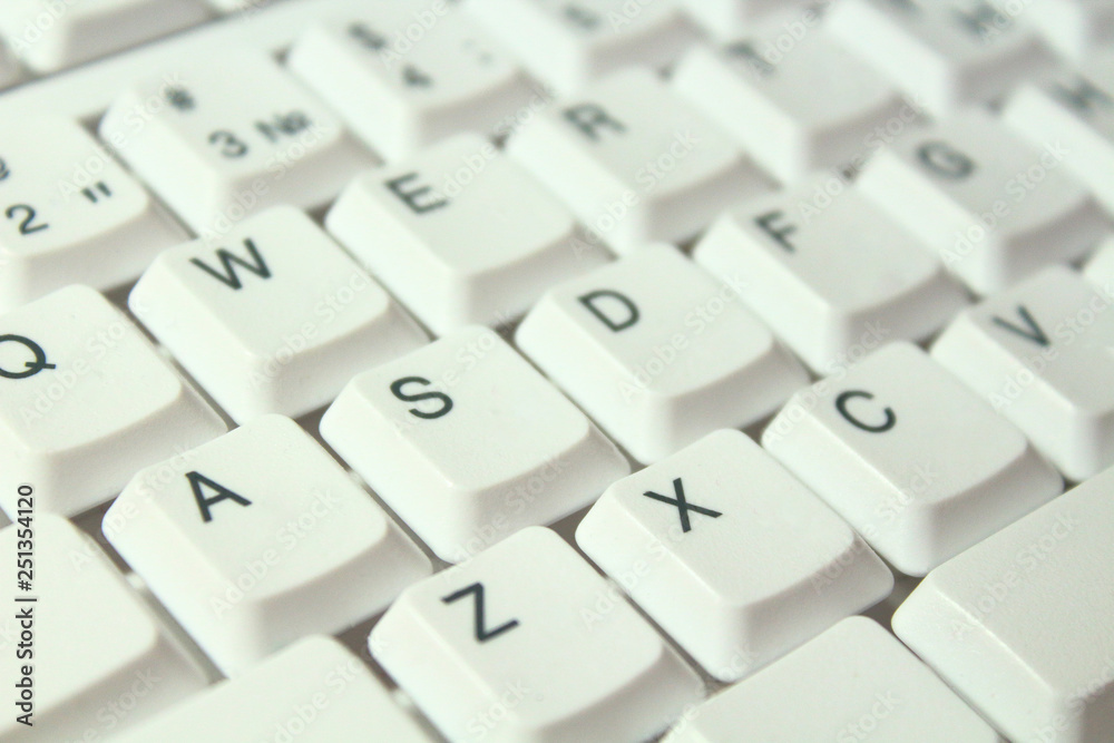 White computer keyboard. Close-up. Background. Texture. White computer keyboard. Close-up. Background. Texture.