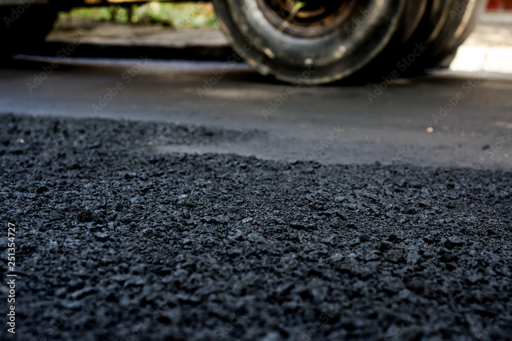 Laying of new asphalt. The new road. Road repair street. Laying of new asphalt. The new road. Road repair street.