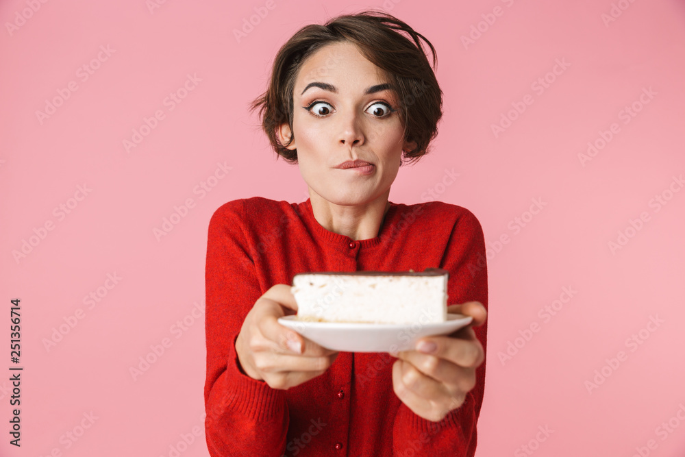Portrait of a beautiful young woman wearing red clothes Portrait of a beautiful young woman wearing red clothes