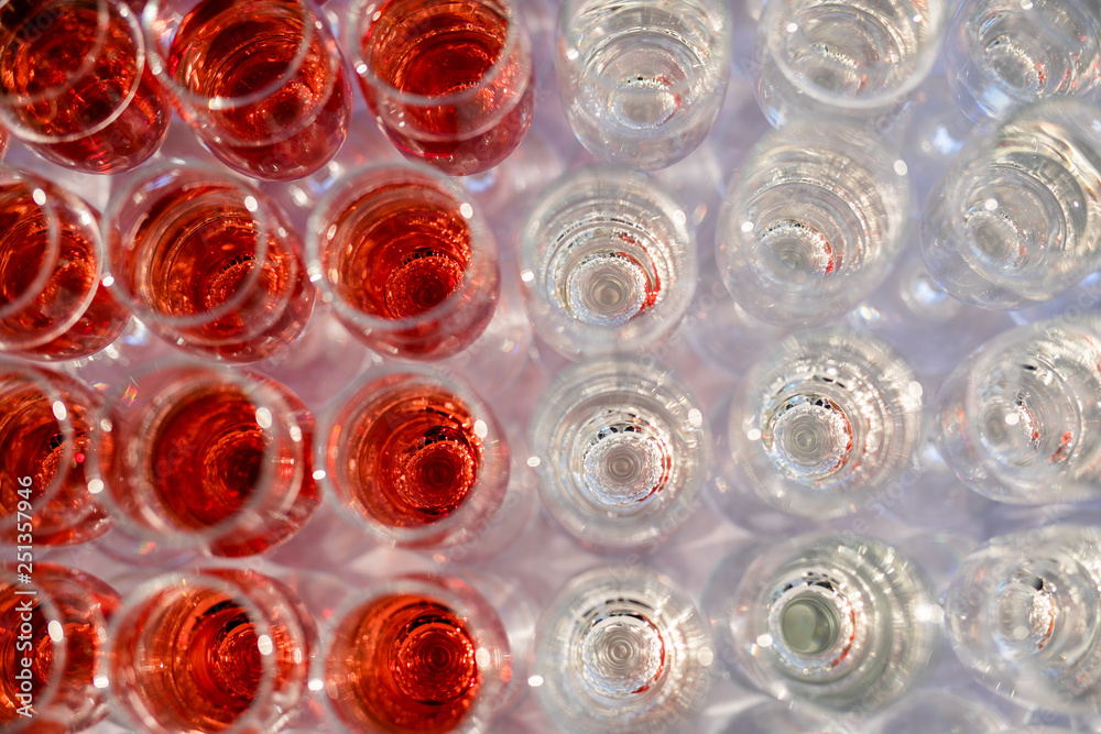 Blured background from wedding glasses filled with champagne Blured background from wedding glasses filled with champagne