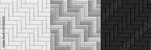 Black and white seamless textures of herringbone tiles. Set of vector grayscale paving floor