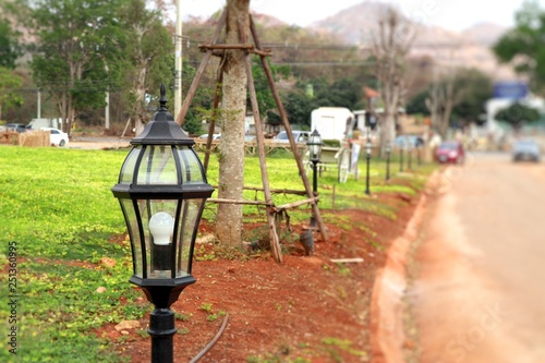 Decorative lamp pole in park