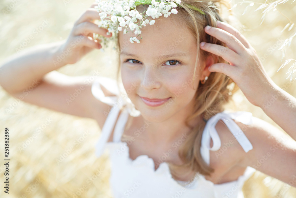 Girl with a wreath of flowers Girl with a wreath of flowers