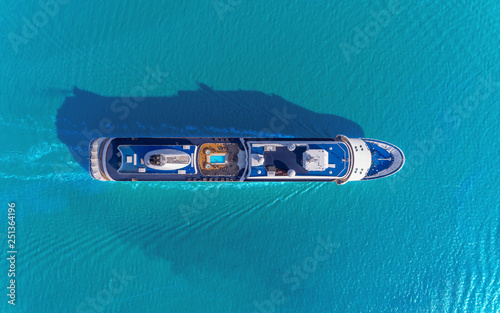 Aerial top view Yacht boat on the sea for tourism or transportation. © Pawinee