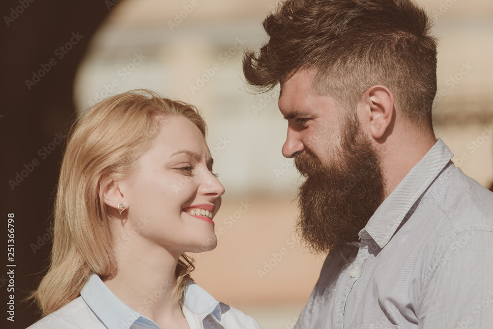 Happy to be in love. Couple in love on summer day. Loving couple of woman and hipster dating outdoor. Feeling love and romance. Sensual woman and bearded man enjoy romantic date Happy to be in love. Couple in love on summer day. Loving couple of woman and hipster dating outdoor. Feeling love and romance. Sensual woman and bearded man enjoy romantic date