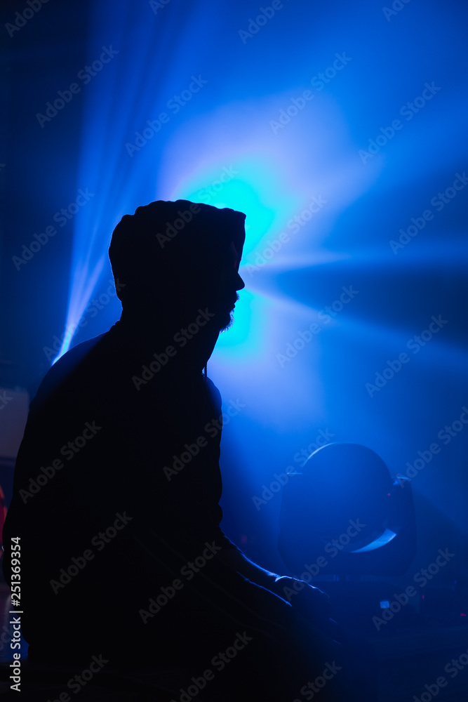 Silhouette of a man in the light