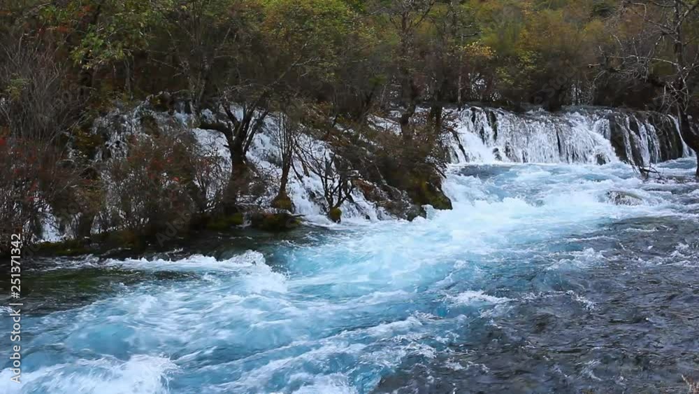 Blu color in river near Suzheng waterfall, Jiuzhaigou National Park ,Sichuan Province, China, Asia Blu color in river near Suzheng waterfall, Jiuzhaigou National Park ,Sichuan Province, China, Asia