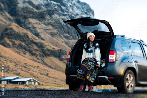 Fotografie Female traveler enjoying Iceland view from the car