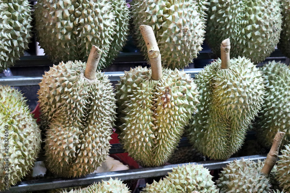 Exotic fruits - durian, stand in two rows on the counter, Thailand. Exotic fruits - durian, stand in two rows on the counter, Thailand.