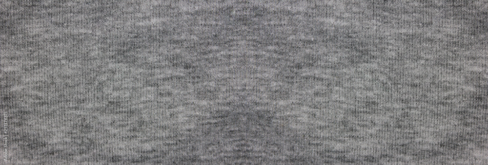 Gray fabric texture background of faded grey colored sweater. Cloth surface & material design for empty backdrop, modern fashion clothes pattern. Blank wide canvas and copy space template Gray fabric texture background of faded grey colored sweater. Cloth surface & material design for empty backdrop, modern fashion clothes pattern. Blank wide canvas and copy space template