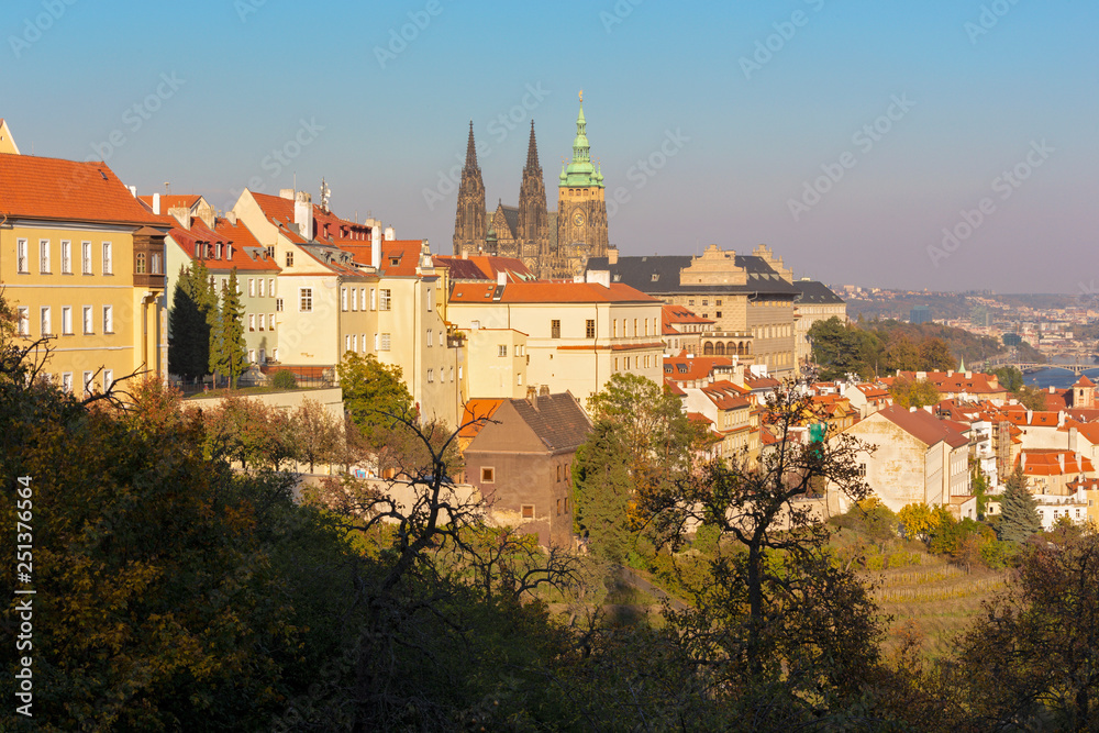 Prague - The Hradčany, Castle and St. Vitus cathedral from Petrin in evening light.